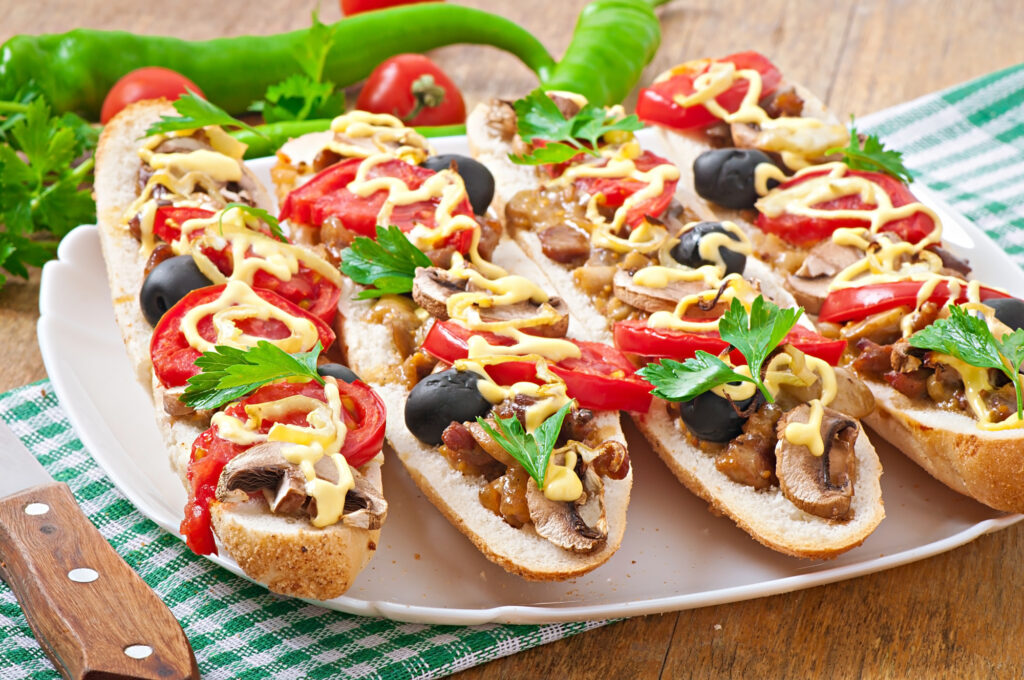 Discover the ultimate chicken cheesesteak recipe, a mouthwatering sandwich loaded with tender chicken, melted cheese, sautéed onions, and bell peppers, all nestled in a perfectly toasted hoagie roll.